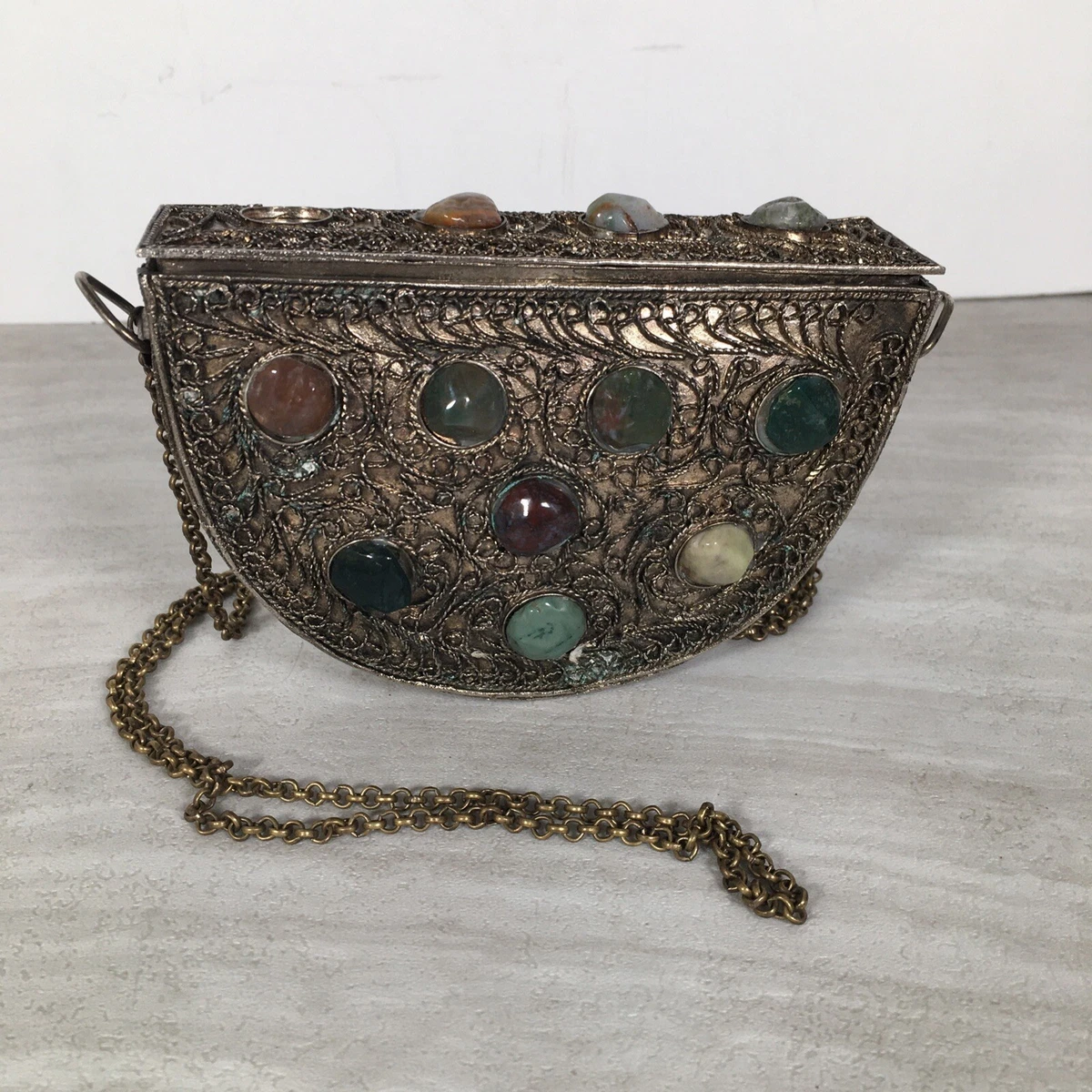 Stone hand deals purse