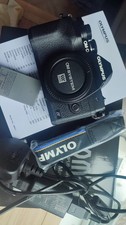 Olympus OM-D E-M10 Mark IV Black Camera Body only. Used but excellent condition.