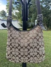 Coach signature hobo and shoulder bag Brown Silver Snap magnetic closure Pockets