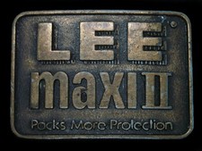 TD01104 VINTAGE 1970s LEE MAXI II PACKS MORE PROTECTION ADVERTISEMENT BUCKLE