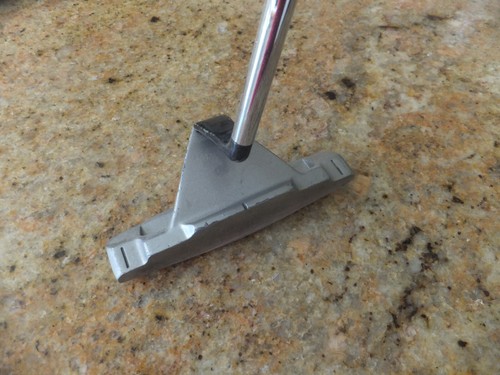 The PENDULUM putter 35" very solid and weird looking SUPER SOLID ROLL