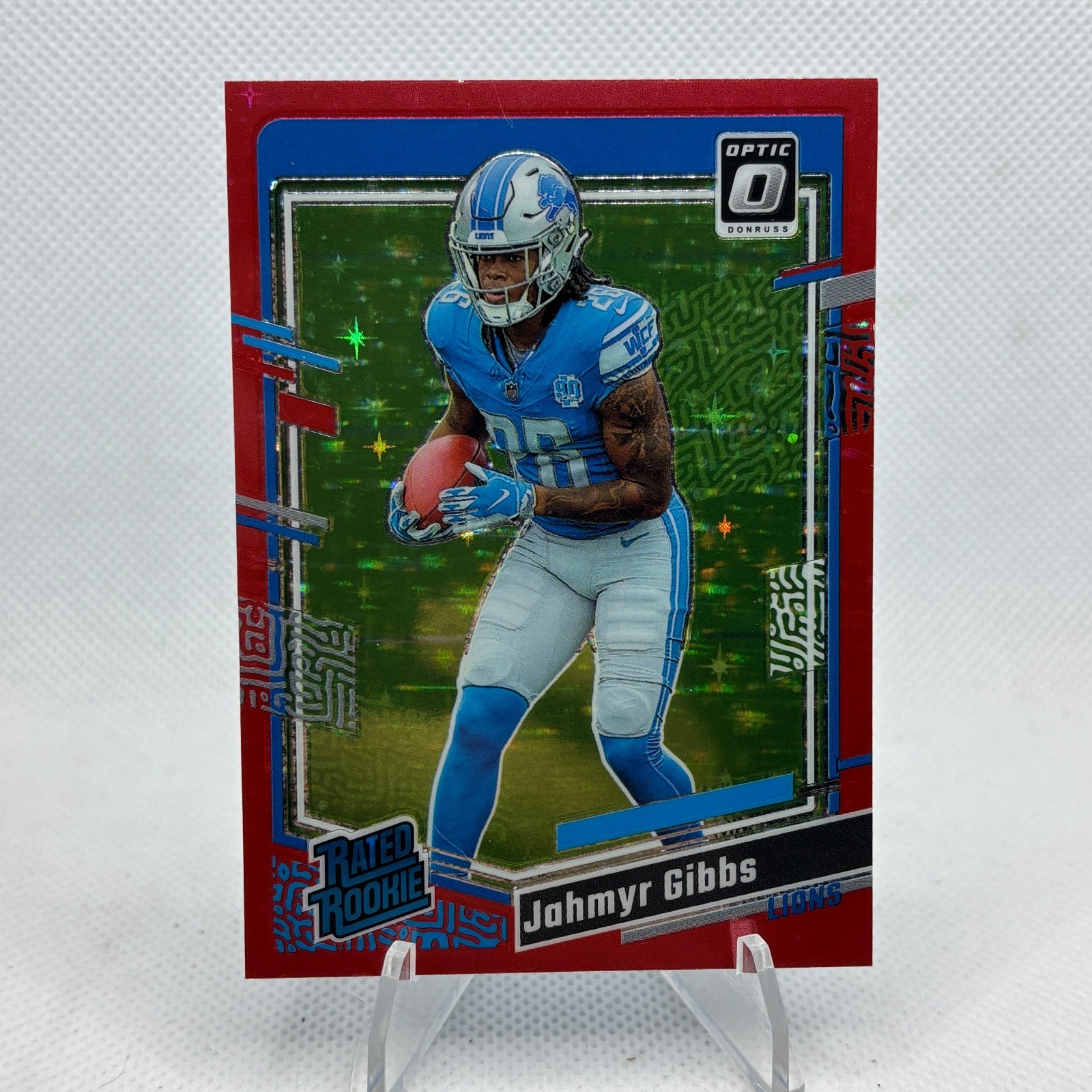 2023 Panini Donruss Optic #236 Jahmyr Gibbs Red Stars Prizm Detroit Lions