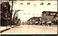 Broad Street in Elyria Ohio OH Dutch Henry's Bargain Store 1900s RPPC Postcard