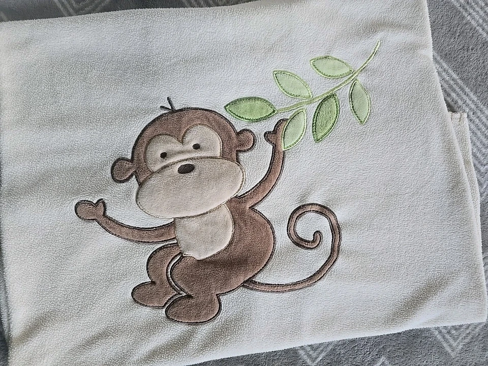 Manta polar para bebé Garanimals Cream Monkey Foto 2 de 4