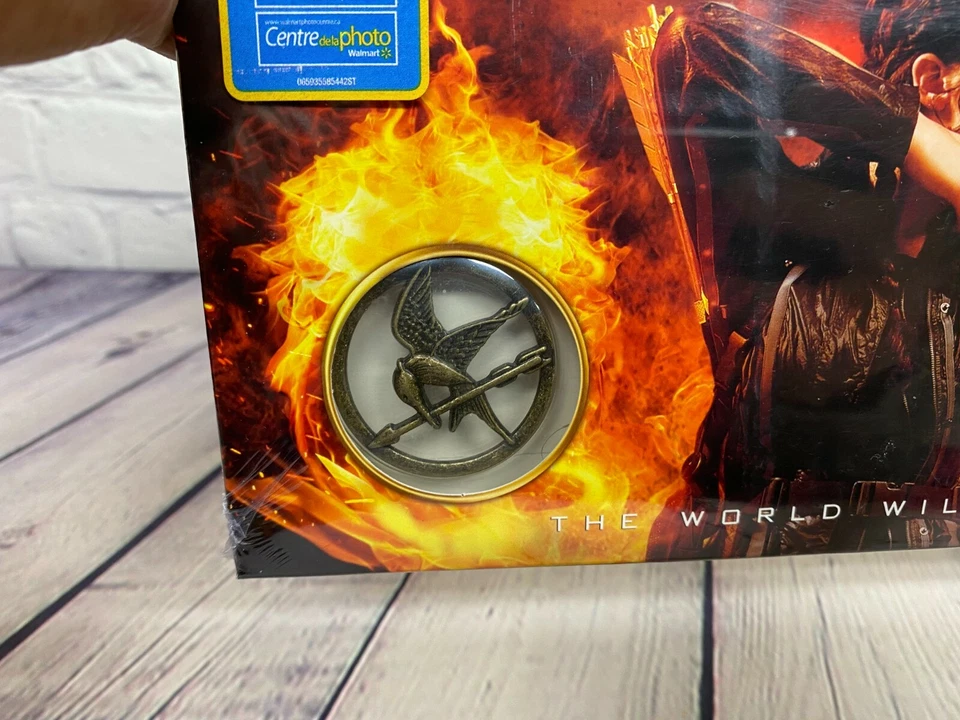 The Hunger Games Movie Blu Ray Walmart Exclusive with Mocking Jay Pendant New - Image 3 of 4