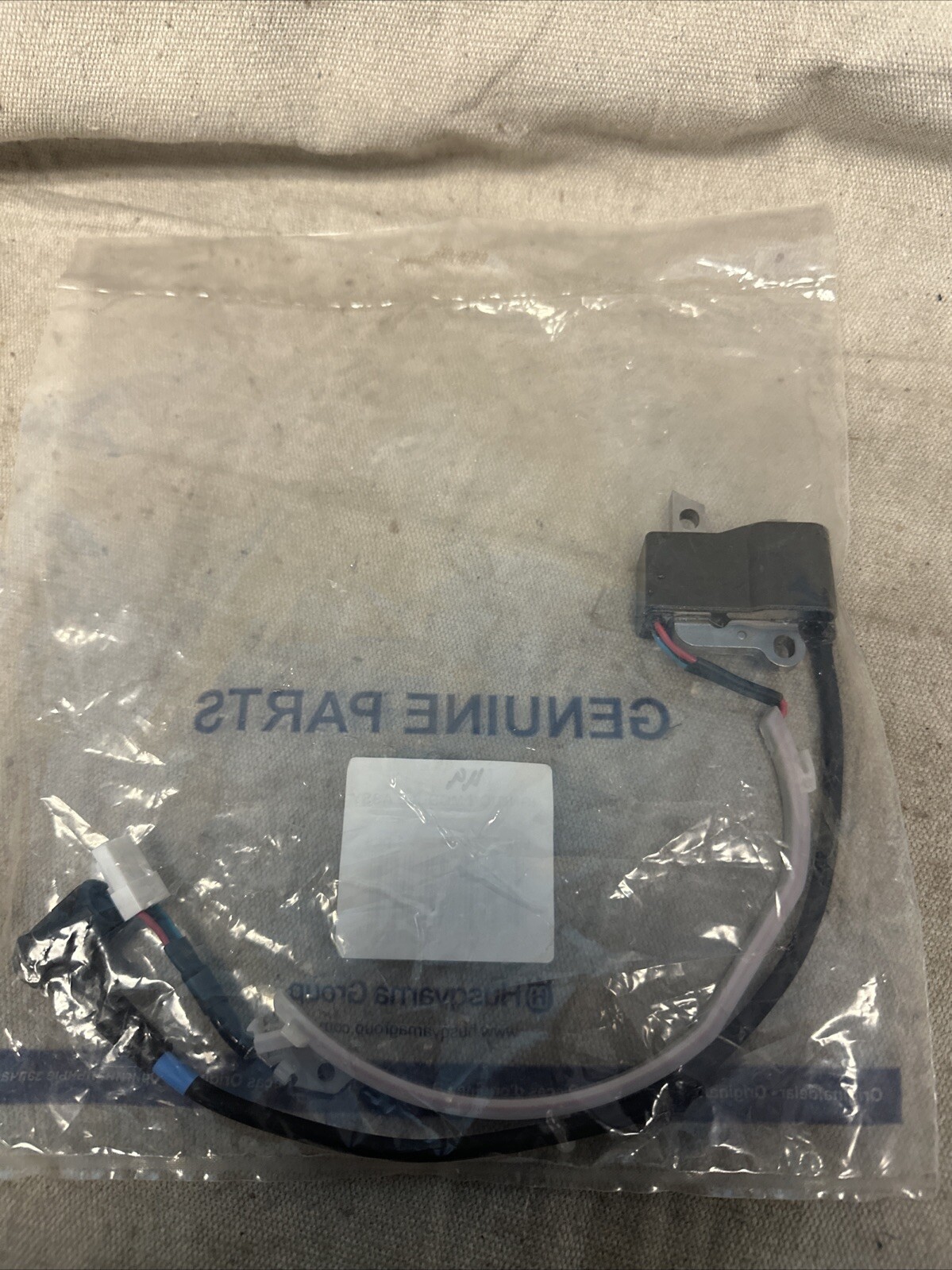 Husqvarna OEM 550 xp mark 2 ignition module coil # 582777404 for 