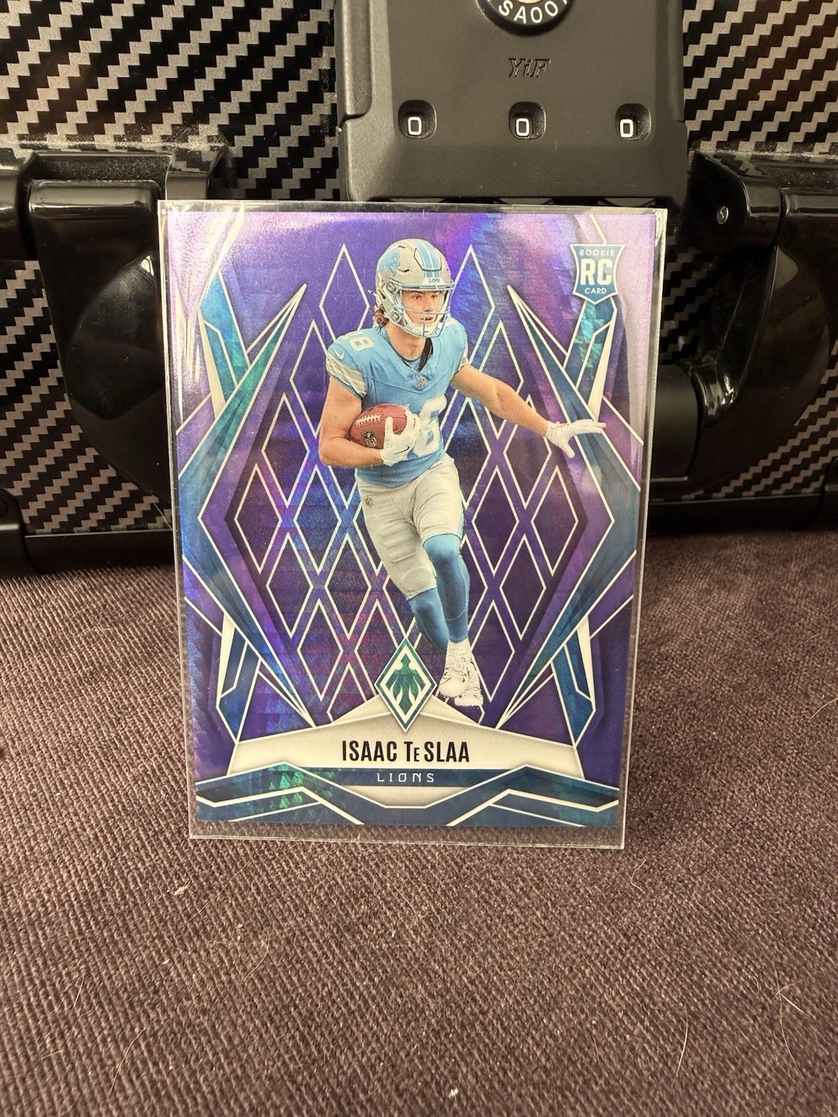2025 Panini Phoenix - Rookies Isaac Teslaa #189 Purple Winter /249 (RC)