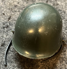 VINTAGE ORIGINAL ACTION MAN GREEN ARMY HELMET WITH STRAP GOOD CONDITION FOR AGE
