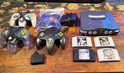 N64 w/ HDMI converter, 4 games, 2 wired controllers & 1 wireless controller.