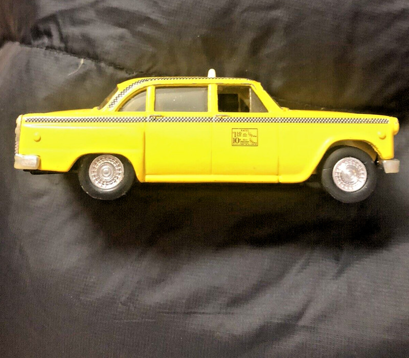 Vintage Yellow Checkered Cab Toy Taxi