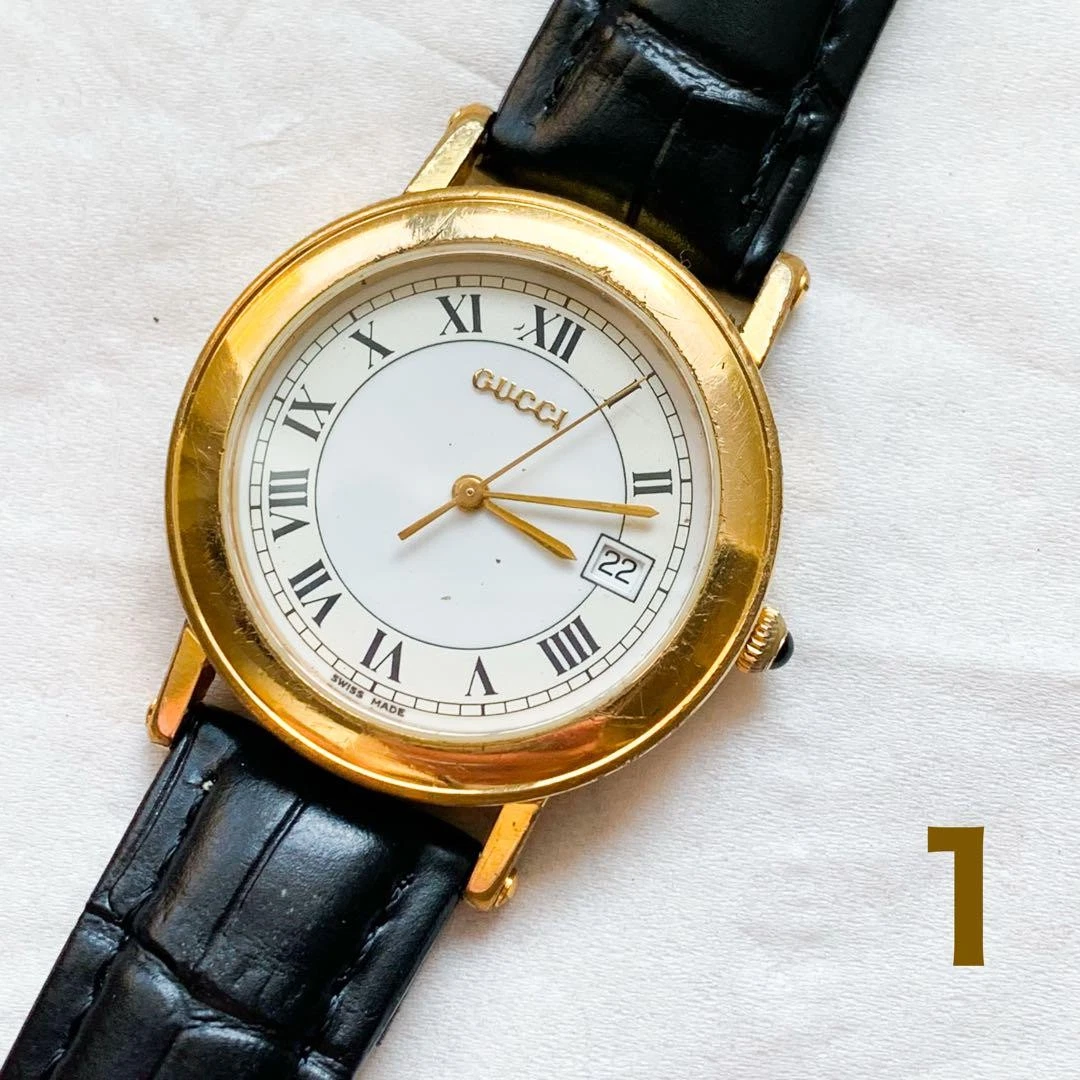 Montre Homme GUCCI 7200M Cadran Or Cadran Blanc Analogique Quartz Article Fonctionnel