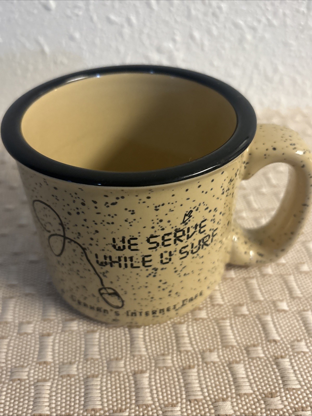 speckled ceramic mug “We Serve While You Surf J Grahams Internet Café M Ware 