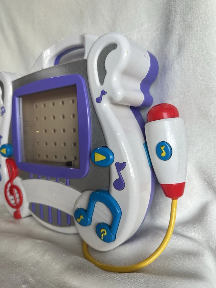 Sistema de aprendizaje interactivo Mattel Learn Through Music 2002 con 4 cartuchos Foto 3 de 4