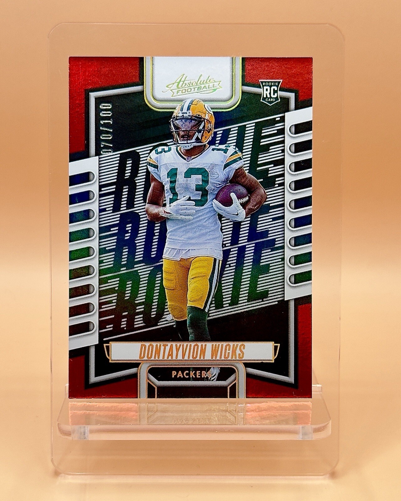 2023 Panini Absolute - Rookies Red Spectrum #199 Dontayvion Wicks /100 (RC)