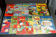 11 Mickey Mouse Booklets from 1961 No.35-45.  last 4 issues some with see picture + stamp