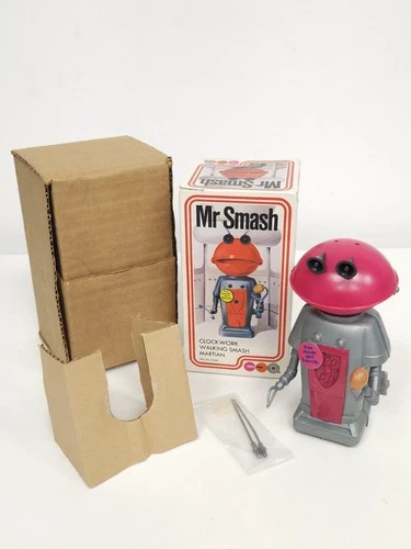 VINTAGE MR SMASH CLOCKWORK WALKING SMASH MARTIAN NEW BOXED - Cadbury's robot toy