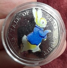 coloured 50 pence coin 2017 peter rabbit blue coat