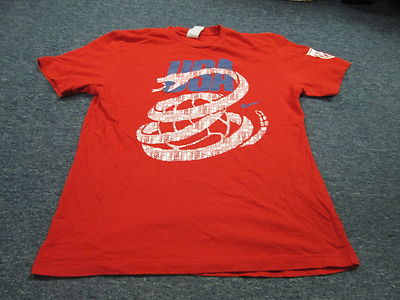 red white and blue nike shirt