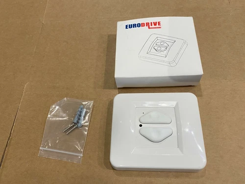 Wireless wall switch for Eurodrive / DRS roller garage door remote system.
