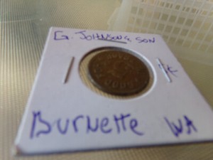 TOKEN JOHNSON & SON, BURNETT, WASHINGTON GOOD FOR 5 CENTS IN TRADE