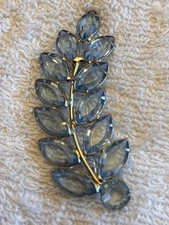 Beautiful blue fern sprig brooch/pin. Light blue but in some lights looks violet