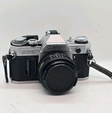  Exc 5 Canon AE-1 silver body Canon NFD 50mm 1:1.8 Lens JAPAN