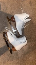 Riedell Motion figure skates size 5. Barely Used.