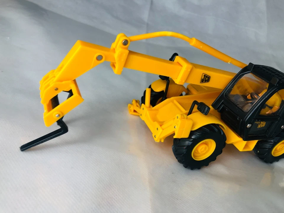 Coche de juguete JCB amarillo vintage ra Foto 3 de 4