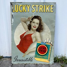 RARE 1940's Lucky Strike Cigarettes Pin Up Embossed Tin Tacker Metal Sign