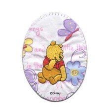 Disney Winnie The Pooh Iron-On Patch: White Oval Winnie Sitting w/Flowers New
