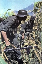 WW2 Picture Photo German soldiers advancing across the field 6006