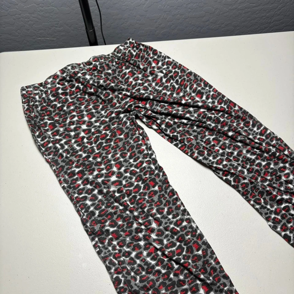 Pantalones Y2K tiro bajo Just Love rojo y negro estampado de leopardo Foto 3 de 4