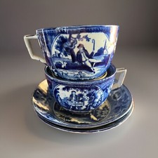 Pair ANTIQUE TRANSFERWARE TEA CUP  SAUCER, Tea Party Pattern C 1820
