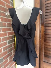 Missguided black romper US4, sleeveless, v neck, ruffles and pull on style