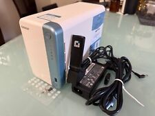 Upgraded QNAP TS-251D 2 Bay NAS drive with Wi-Fi USB adapter and remote control