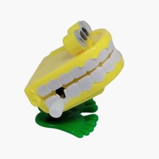 Wind Up Chattering Teeth Dancing Dentures Toy Yellow Creeping Hungry Toy