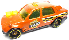 2019 HOT WHEELS TIME ATTAXI TUNED ORANGE 2 3/4" DIECAST CAR WITH YELLOW & BLACK