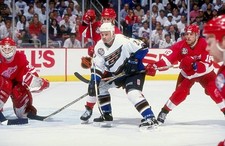 Brian Bellows Washington Capitals is hooked by Kirk Maltby Detroit- Old Photo