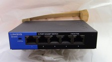 Linksys SE3005 V2 5-Port Gigabit Ethernet Switch and power adapter - tested fine