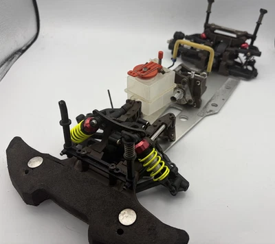 For parts Kyosho engine car FW-04? 4WD chassis vintage rare some parts lost - image 1 of 4