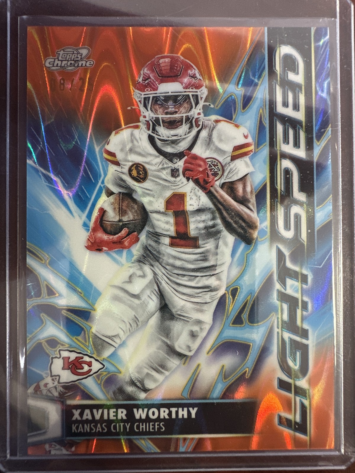 2025 Topps Cosmic Xavier Worthy Light Speed Orange Galactic Refractor #/25