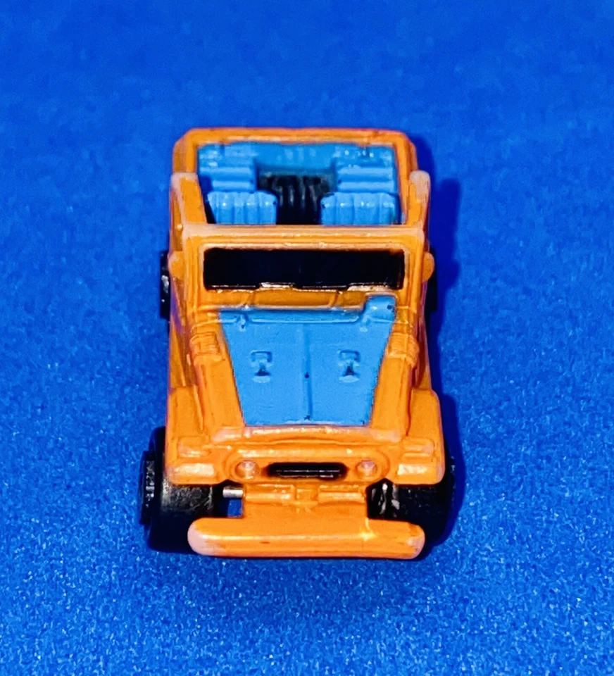 Micro Máquinas TOYOTA LAND CRUISER 1987 Galoob De Colección Naranja y Azul Foto 2 de 4