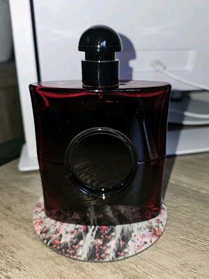 Yves Saint Laurent (YSL) Black Opium Eau de Parfum Over Red with