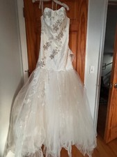 David s Bridal wedding dress size 12 ivory. New with tags.