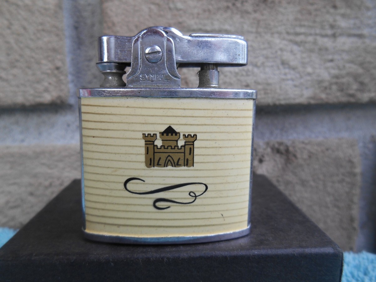 what is the symbol for cigarette lighter VINTAGE SYMBOL KENT CIGARETTES ADVERTISING AUTOMATIC CIGARETTE LIGHTER. WORKS! what is the symbol for cigarette lighter VINTAGE SYMBOL KENT CIGARETTES ADVERTISING AUTOMATIC CIGARETTE LIGHTER. WORKS!