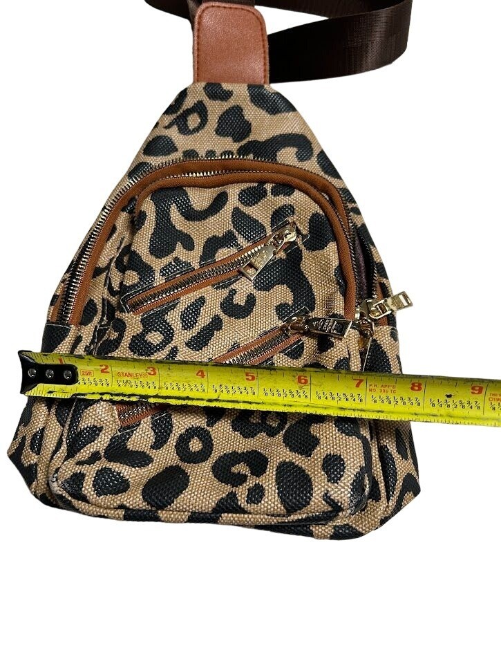 Leopard Print Sling Backpack With Multiple Zippered Pockets