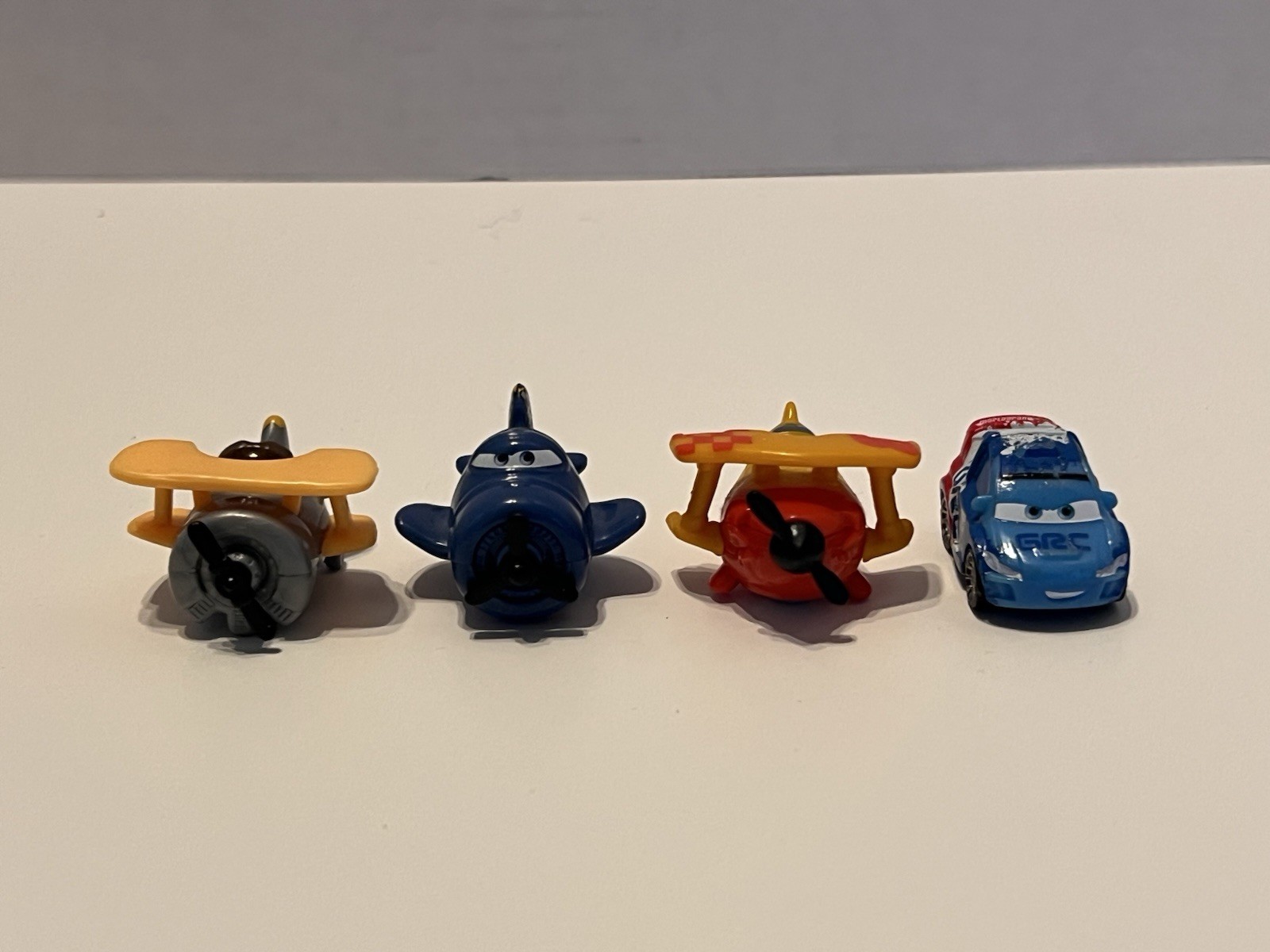 Disney Pixar Cars & Planes Micro Drifters Lot of Four
