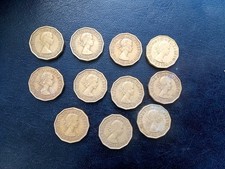 11 x  Three Pence coin of Queen Elizabeth II. 1953-1964