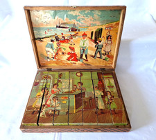 Bilderlege-W&uuml;rfel f&uuml;r 6 Bilder aus 35 W&uuml;rfeln, um 1900, Ma&szlig;e ca. 32x24x5,3cm