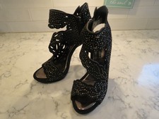 BCBGMAXAZRIA Faricia black platform heels lazer cut stilettos size 9
